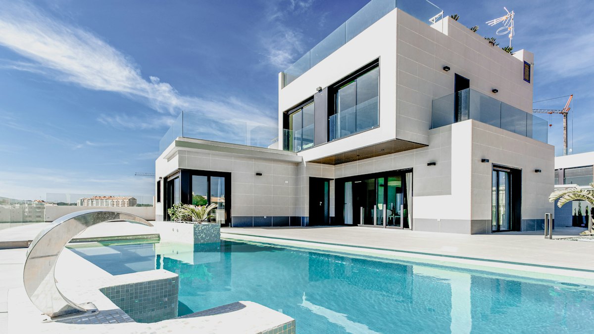 A white house with a pool