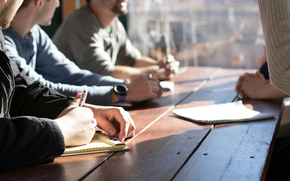 People discussing around a table